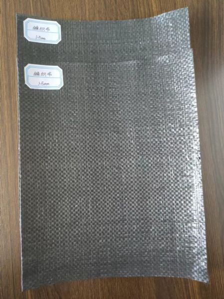 路面抗裂贴的作用与施工优点"1.5黑布样品.jpg"